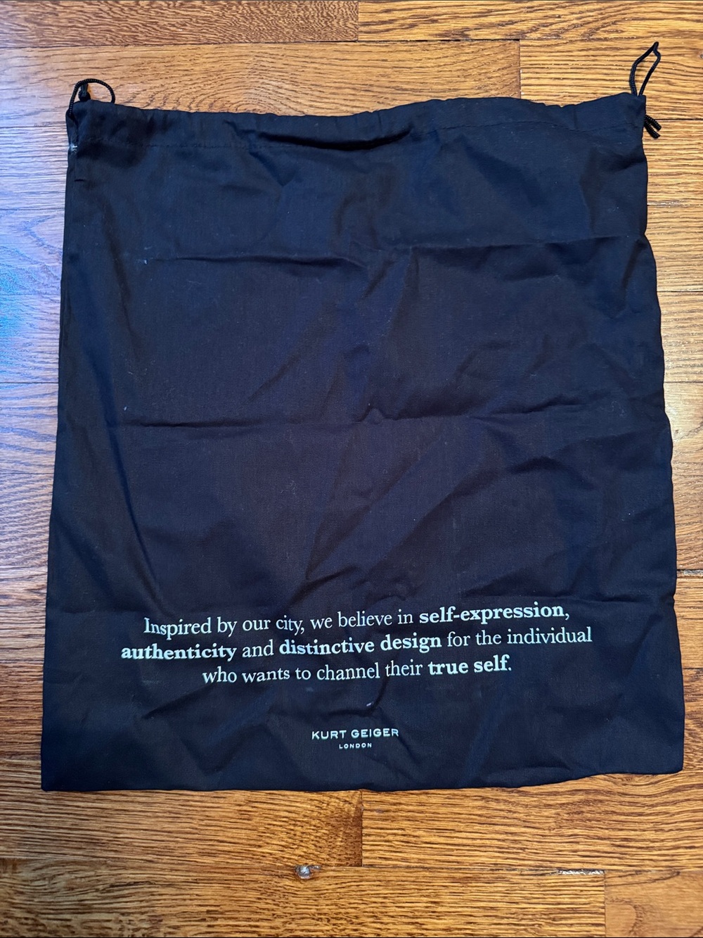 Kurt Geiger Black Drawstring Bag with White Slogan - Picture 2 of 2